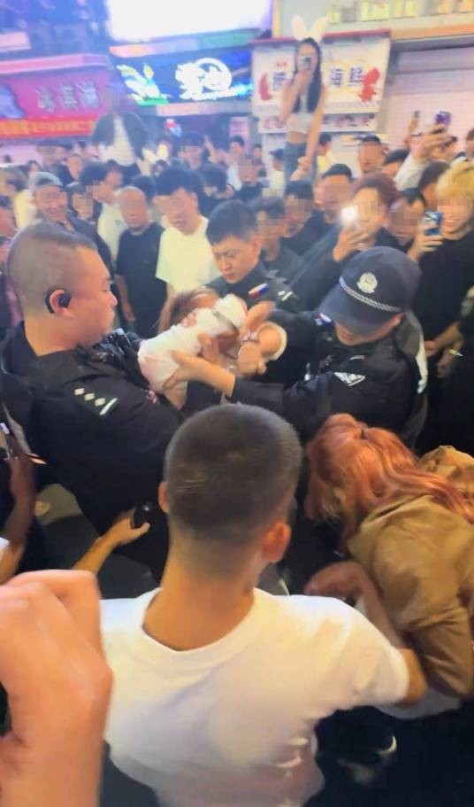 9·14长春两女子被当街铐走事件