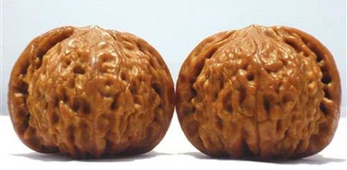 怎样使文玩核桃上色快?